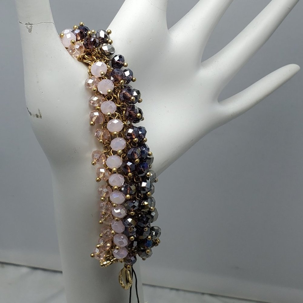 Ali Khan beaded bracelet with gold links. color amethyst-lilac-hematite beads
